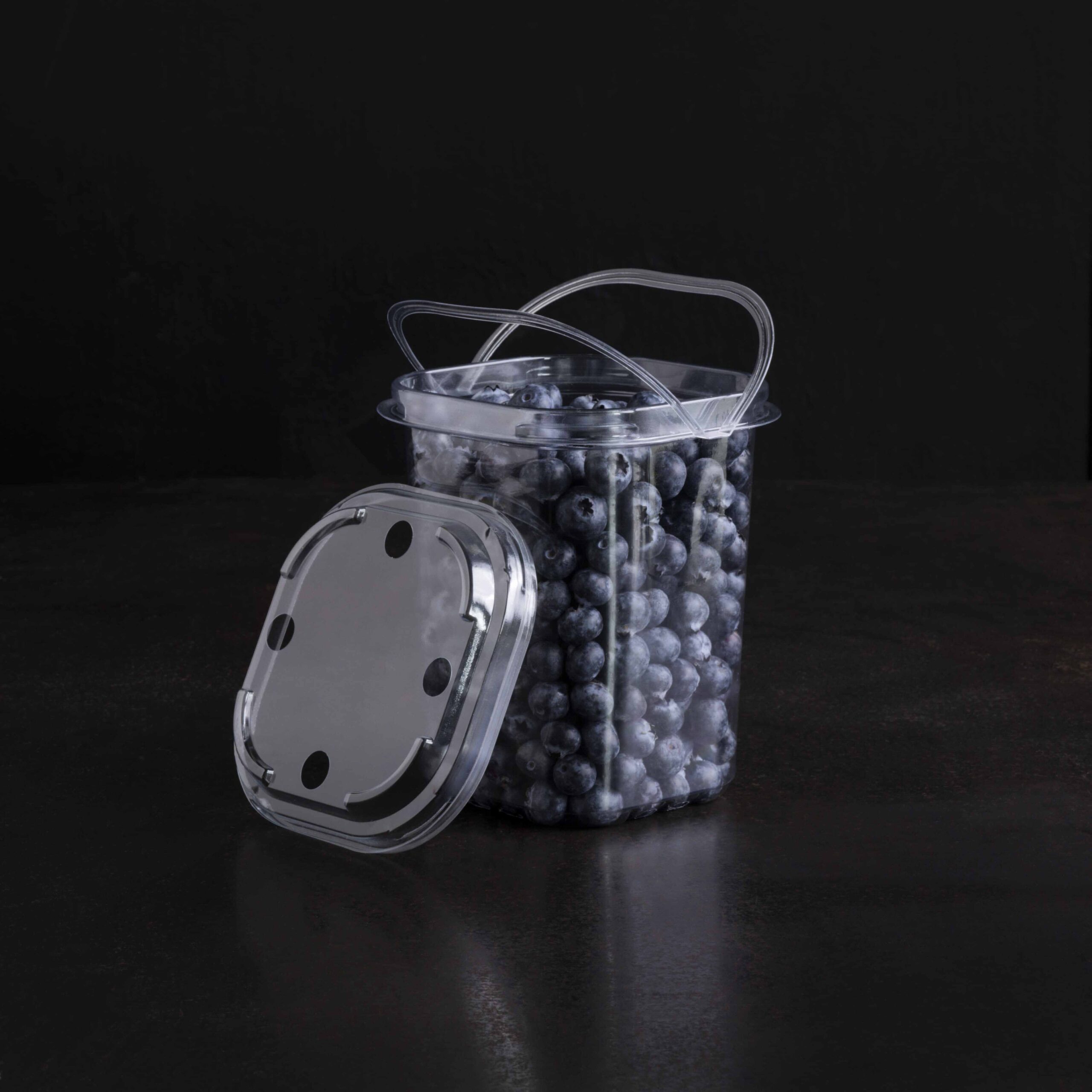 A Yucca Packaging custom bucket and lid for fruit & vegetables.